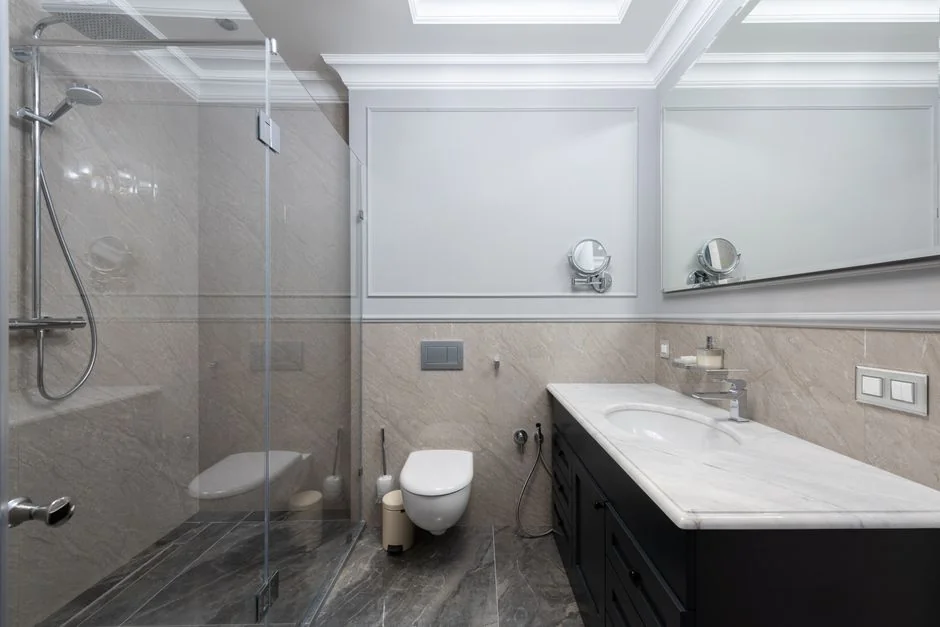 Colleagues interact in a modern office setting, blending technology with workplace hygiene.